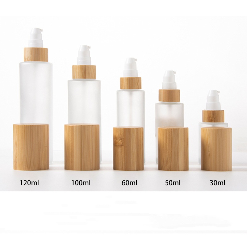 Caidéal Lotion Cosmaideacha Reoite Ceo Mín agus Buidéal Sprae Gloine Lotion Le Clúdach Adhmaid Bambú Caidéal Lotion Cosmaideacha Reoite Ceo Mín agus Buidéal Sprae Gloine Lotion Le Clúdach Adhmaid Bambú