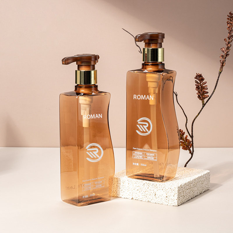 Iontaofa 350ml 500ml Curve-Shaped Amber Pet Buidéal Lotion Comhlacht Folamh le Caidéal le haghaidh Cúram Gruaige oiriúntóir Seampú nó Úsáid Uachtar Aghaidh