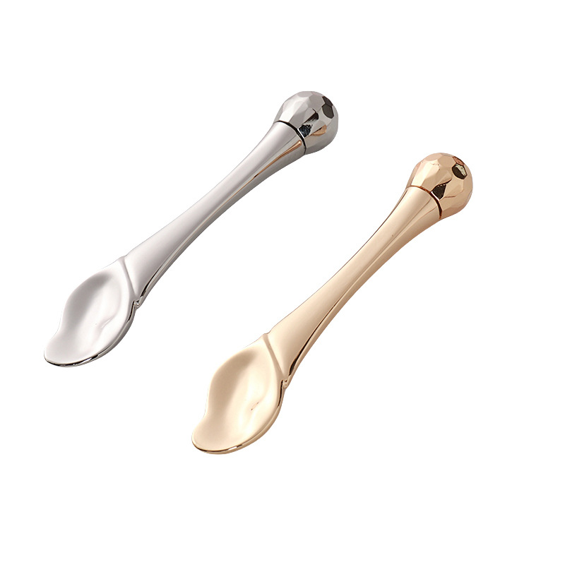 Súl Roller Massage Bata Uachtar Súl Applicator Spatulas Cosmaideacha Spúnóg Aghaidh Frith-Wrinkle Uirlis Cúraim Aghaidh Óir Alloy Súl Roller Massage Bata Uachtar Súl Applicator Spatulas Cosmaideacha Spúnóg Aghaidh Frith-Wrinkle Uirlis Cúraim Aghaidh Óir Alloy