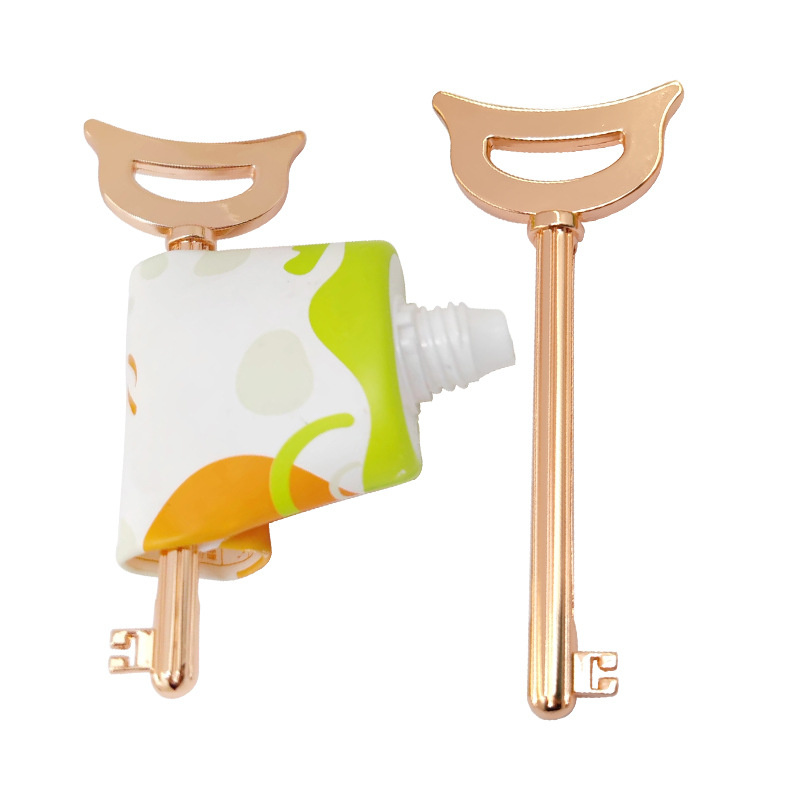 Dearadh Uathúil an Squeezer Feadáin Cóimhiotal Sinc Eochair-Mhúnlaithe Do Phacáiste Dath Uachtar Cosmaidí Cosmaidí fiacla Dearadh Uathúil an Squeezer Feadáin Cóimhiotal Sinc Eochair-Mhúnlaithe Do Phacáiste Dath Uachtar Cosmaidí Cosmaidí fiacla